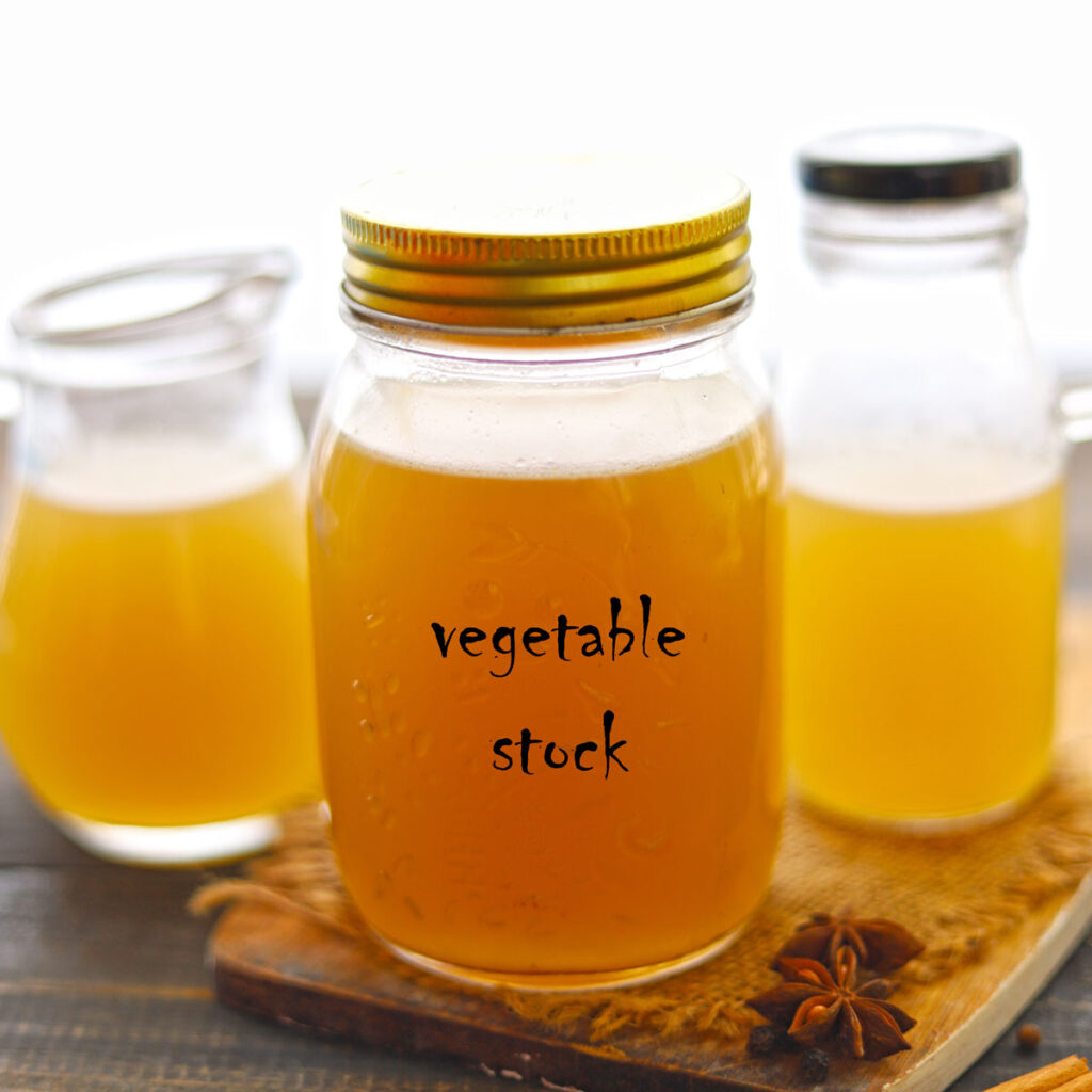 Side Shot Of Vegetable Stock In A Bottle